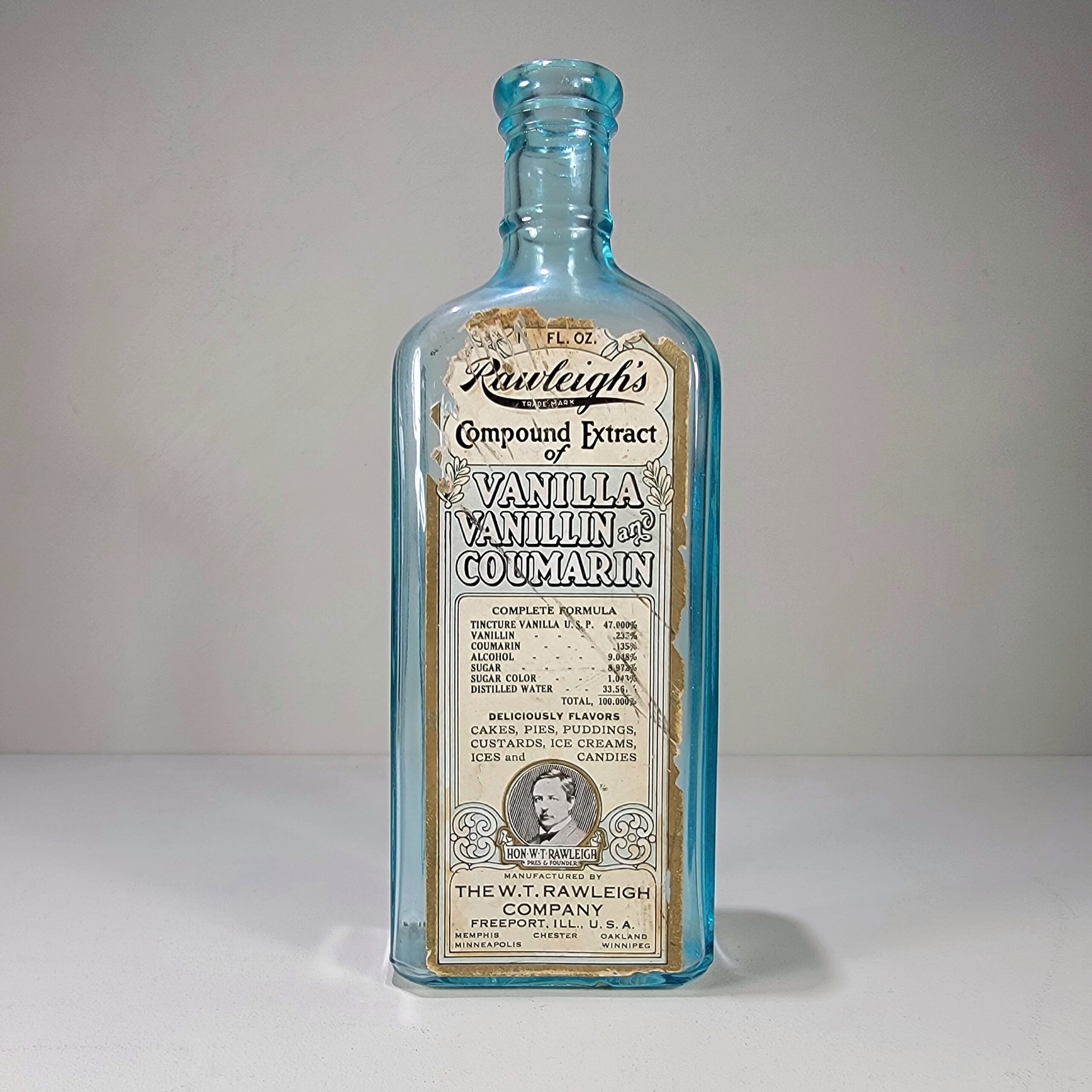 Slide 2 for Vintage Turquoise Glass Bottle, Rawleighs Vanilla and Coumarin Extract