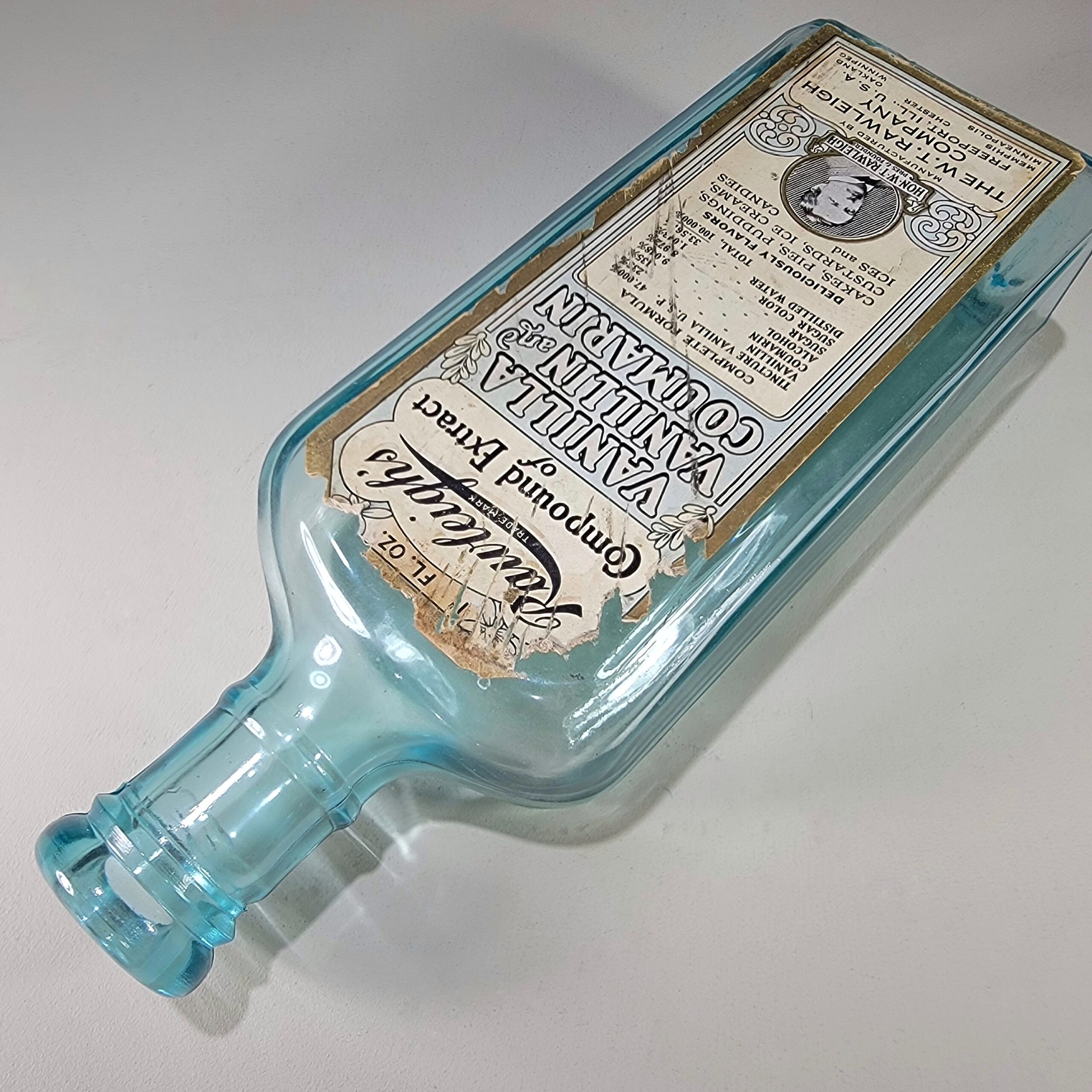 Slide 3 for Vintage Turquoise Glass Bottle, Rawleighs Vanilla and Coumarin Extract