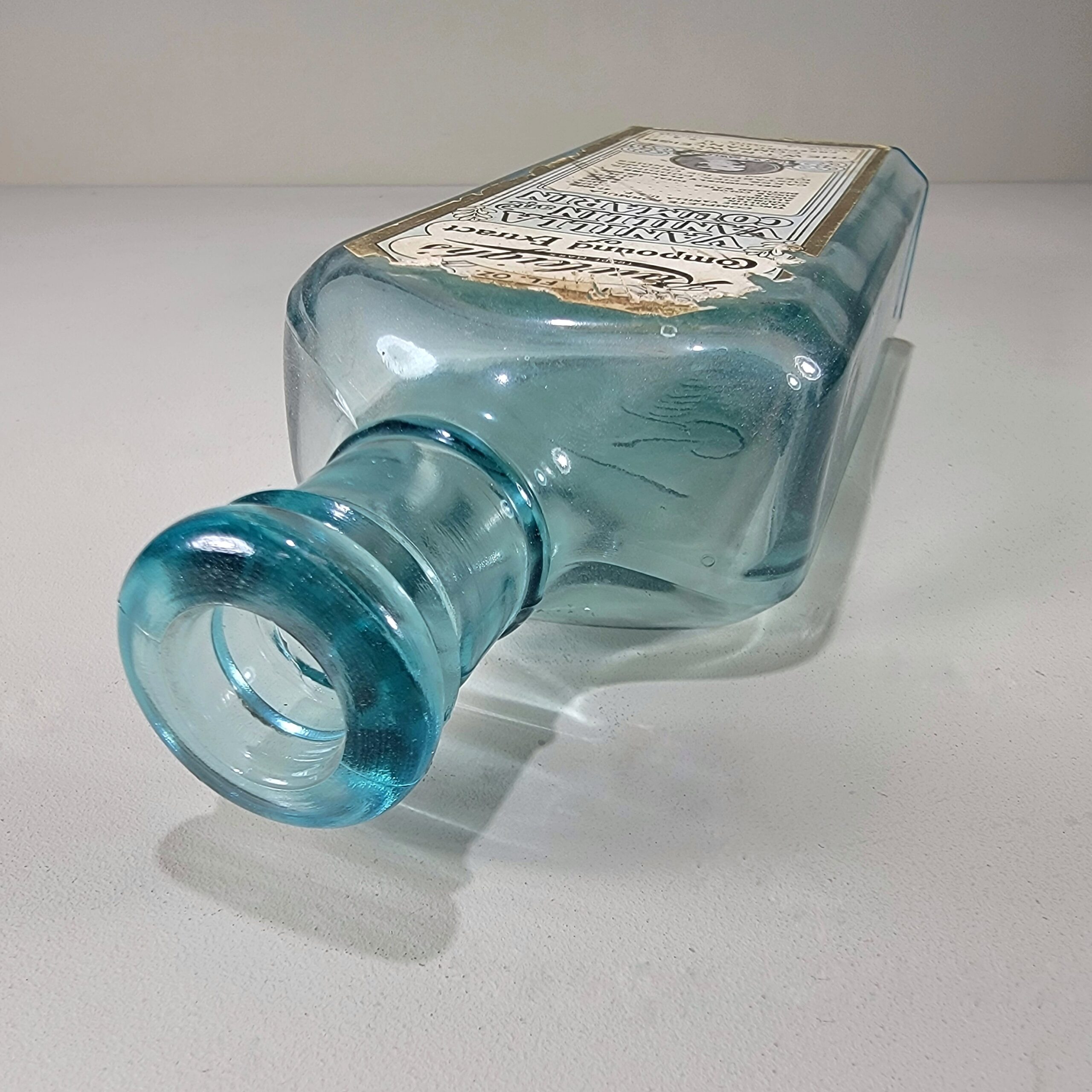 Slide 4 for Vintage Turquoise Glass Bottle, Rawleighs Vanilla and Coumarin Extract