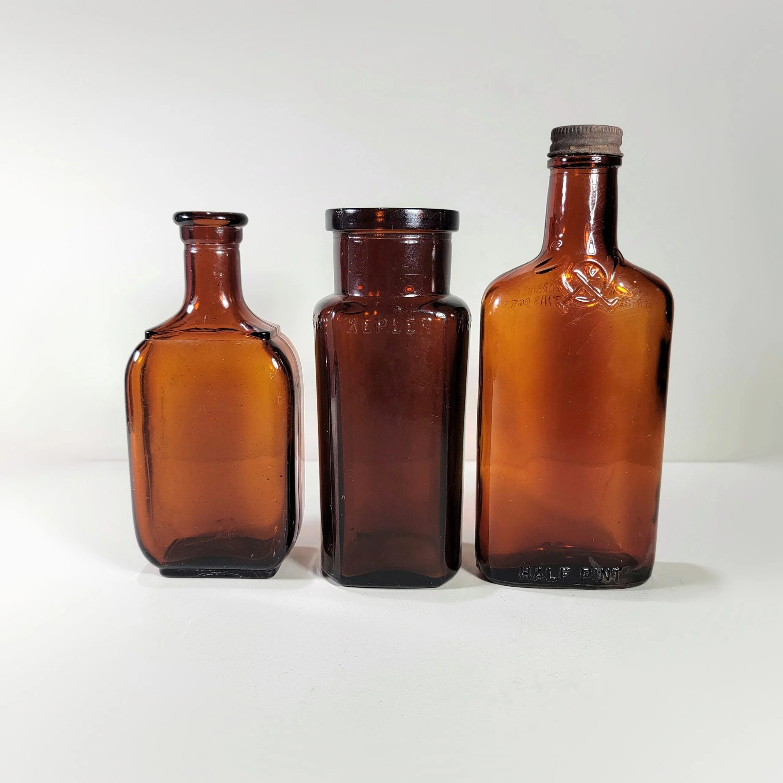 Slide 1 for X3 Vintage Amber Glass Medical Bottle Set
