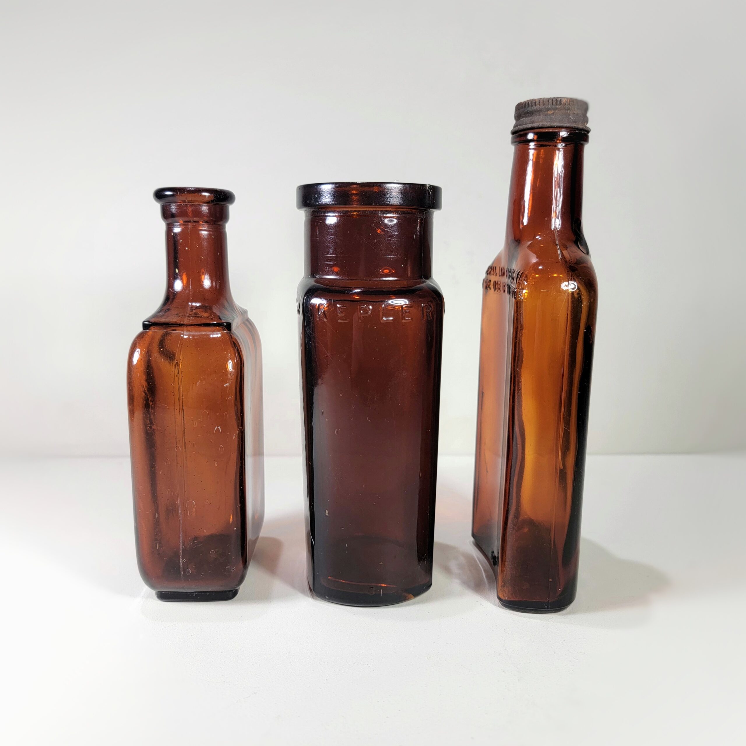 Slide 2 for X3 Vintage Amber Glass Medical Bottle Set