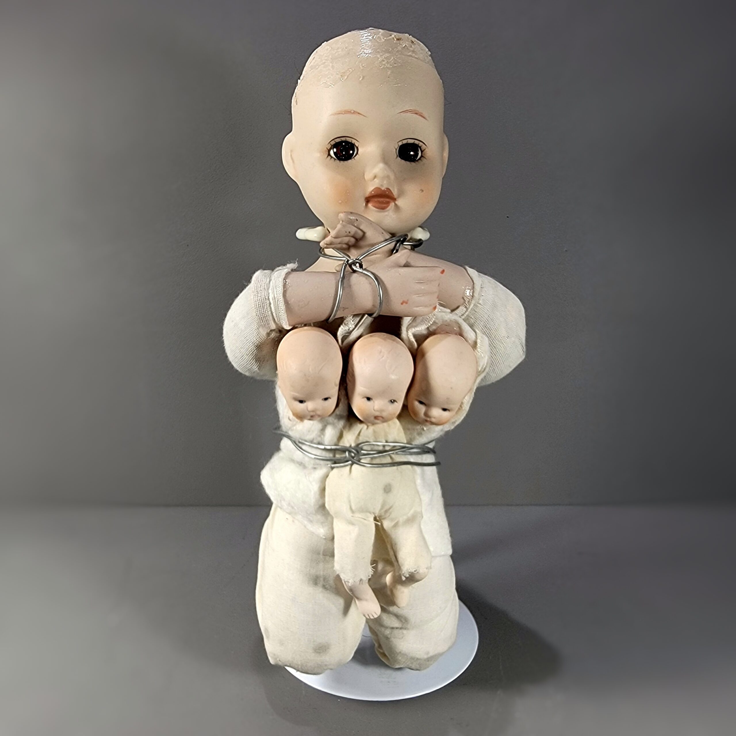 Slide 2 for Vintage Porcelain Bound Doll with Three Headed Baby