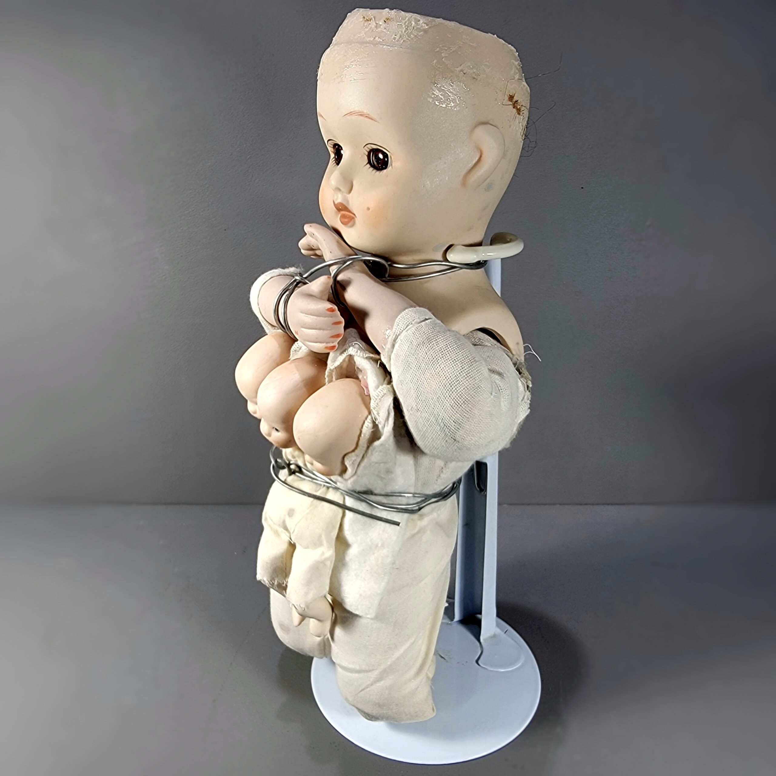 Slide 3 for Vintage Porcelain Bound Doll with Three Headed Baby