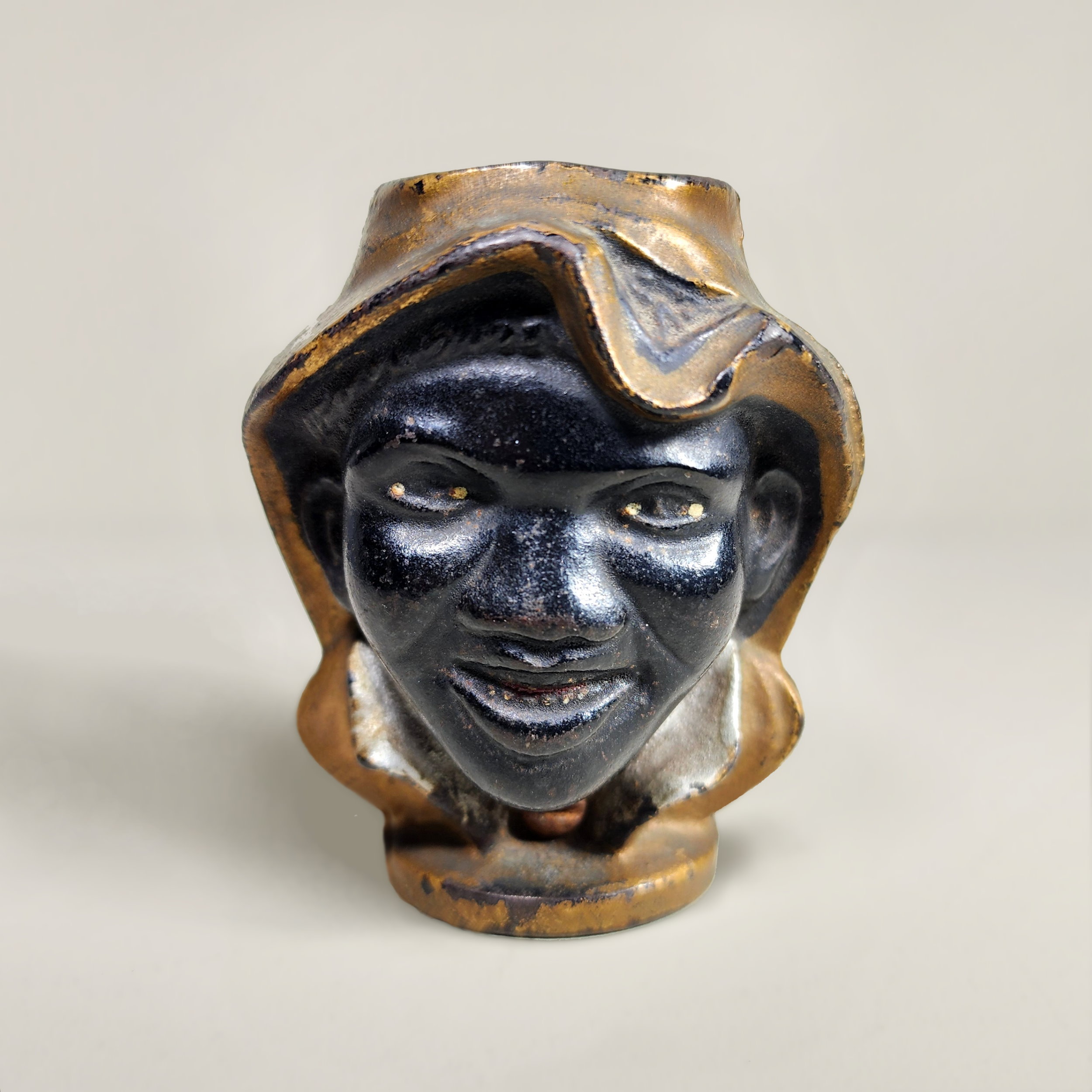 Slide 1 for Vintage Cast Iron Two Faced Coin Bank