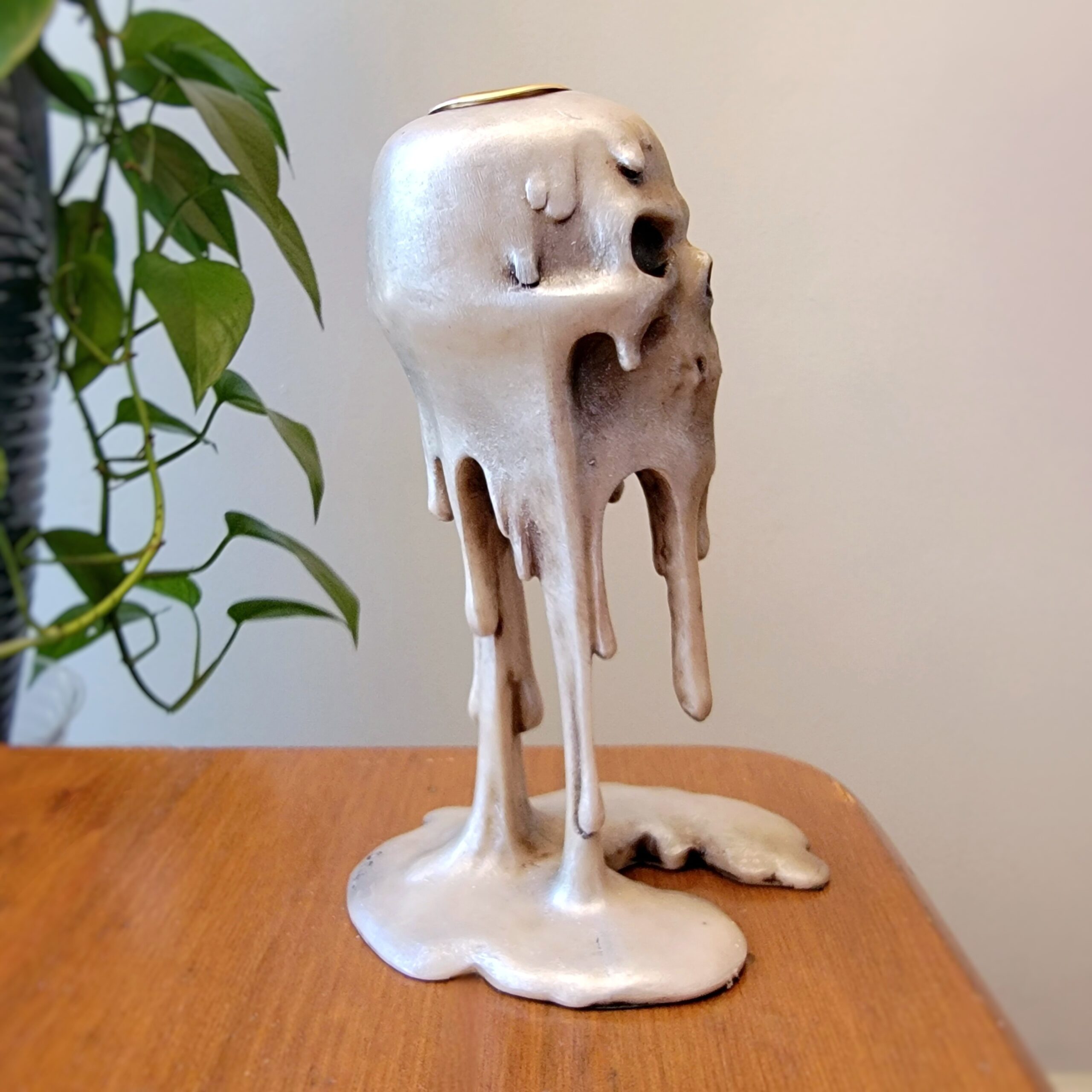 Slide 3 for Melted Skull Candle Holder